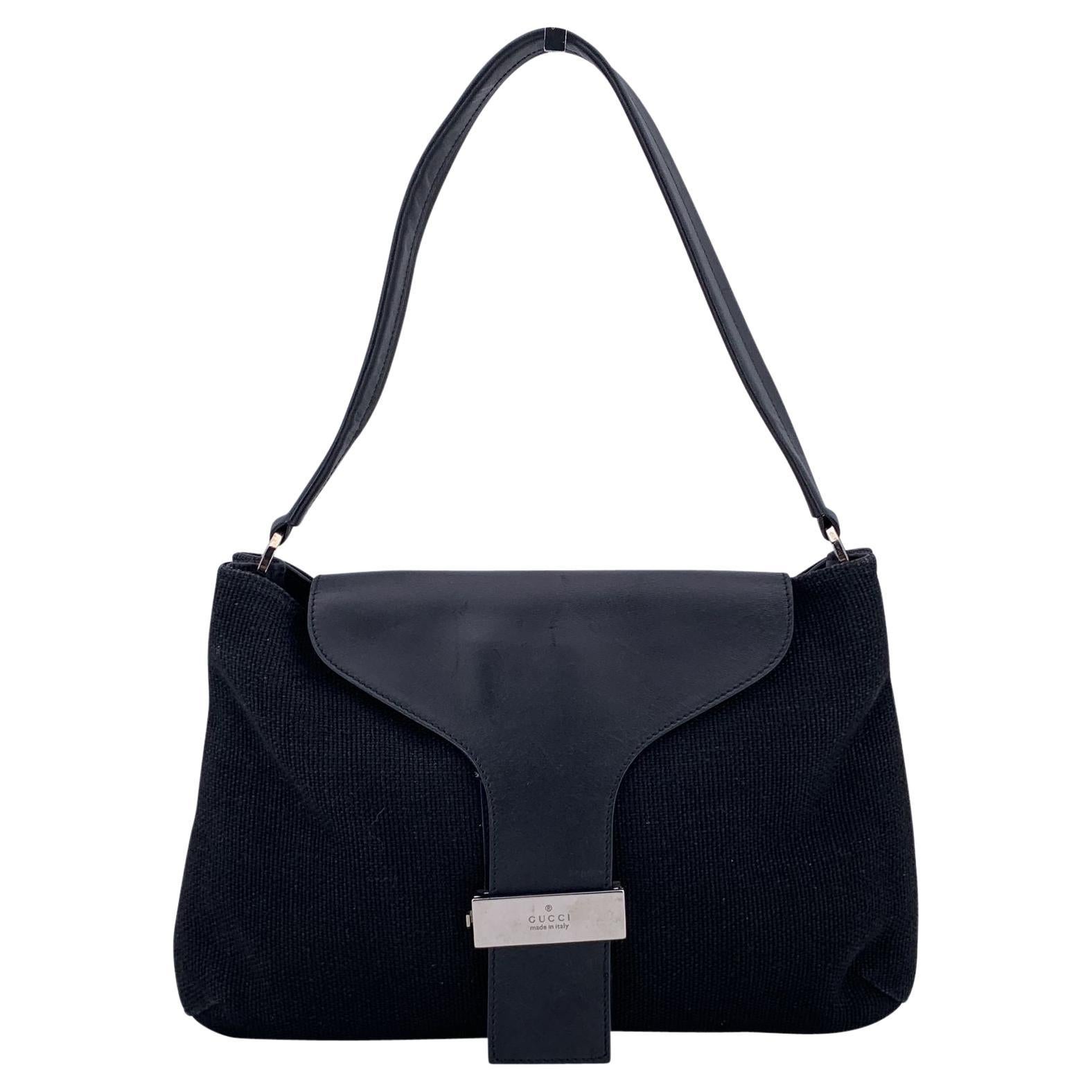Sac à bandoulière à rabat en toile et cuir noir de Gucci en vente