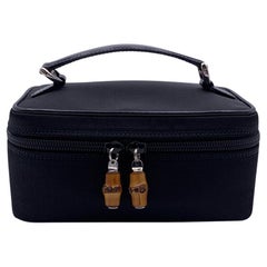 GUCCI “Microguccissima” Black Embossed Leather Zip Cosmetic Toiletry Travel  Bag at 1stDibs