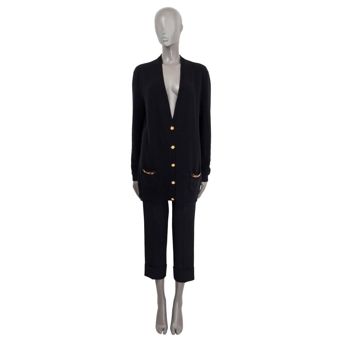 100% authentic Gucci cardigan black cashmere (100%). Features two patch pockets with chain details, gold-tone buttons and a long-line cut. Has been worn and is in excellent condition.

2021 Spring/Summer Ouverture Collection.

Measurements
Tag