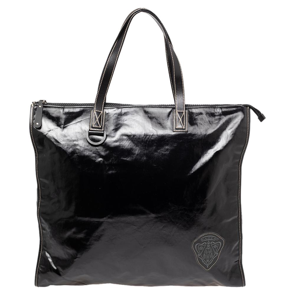 Designed to deliver style and functionality, this tote bag by Gucci has been crafted from coated canvas. It features dual handles, crest detail, a spacious fabric interior, and silver-tone hardware.

Includes: Original Dustbag, Info Booklet
