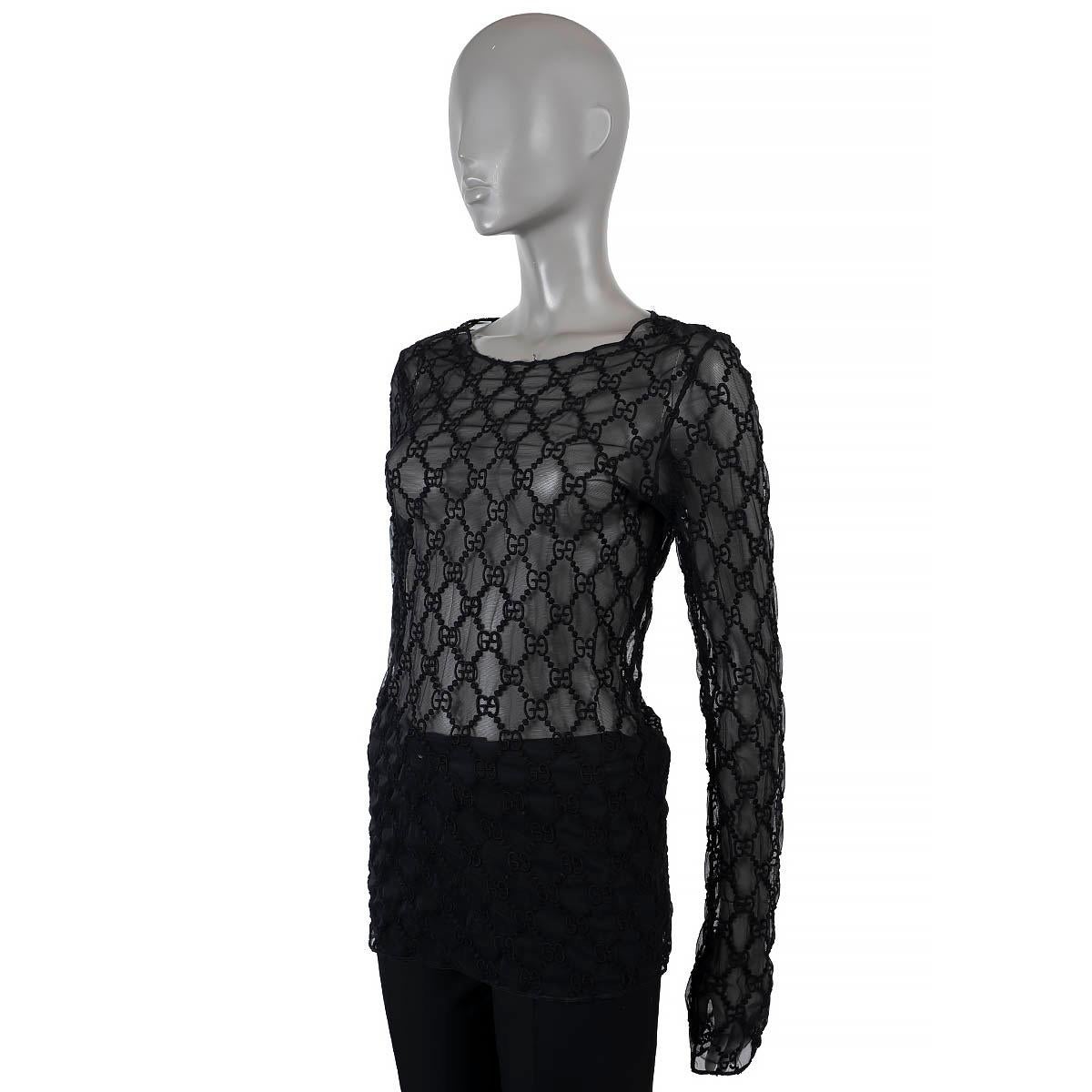 100% authentic Gucci GG embroidered sheer mesh top in black cotton (54%), polyamide (31%), polyester (9%) and elastane (6%) (missing tag). Features a round neck and long sleeves. Has been worn and is in excellent condition. 


Measurements
Tag