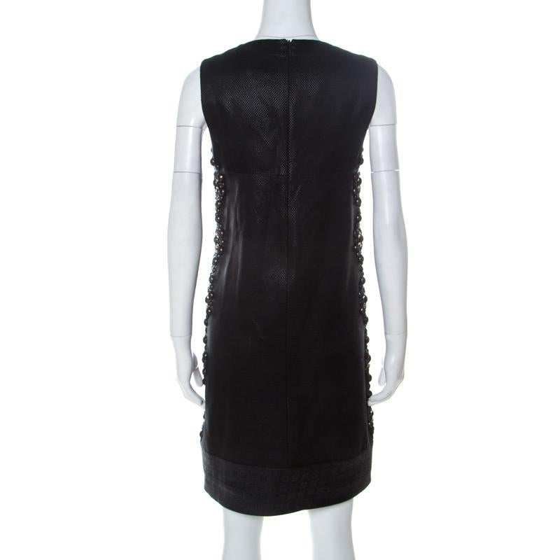 Dress up in this Gucci dress and experience style like never before. The black dress is sleeveless and it features embellishments on the sides and a zip closure. This dress will shine when paired with the right accessories.

Includes: The Luxury