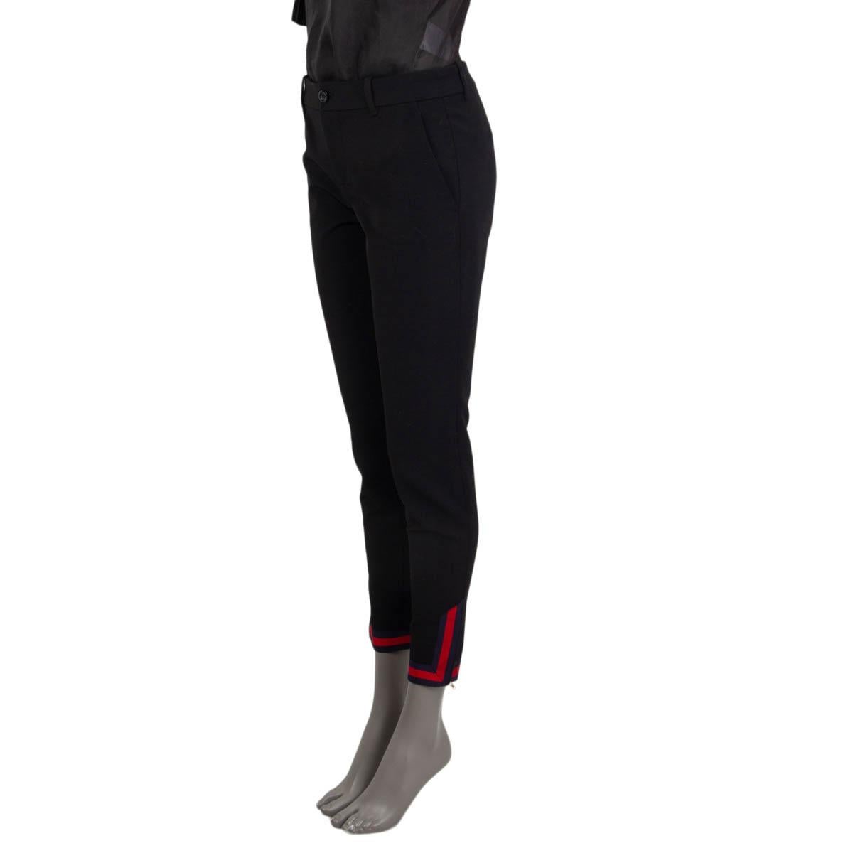 100% authentic Gucci suit pants in black cotton (52%), polyamide (38%) and elastane (10%). Feature zipped, striped cuffs and two slit pockets on the front. Open with two buttons and a zipper at the front. Pockets lined in black viscose (64%) and