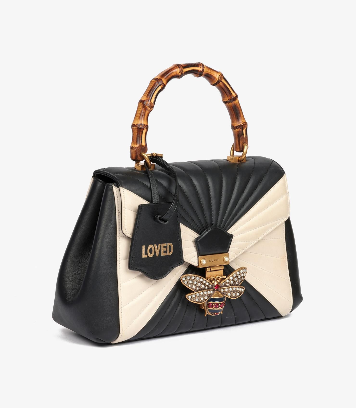 Gucci Black & Cream Quilted Calfskin Leather Medium Queen Margaret Bamboo Top Handle

Product Details
Xupes Ref: HB5751
Brand: Gucci
Model: Medium Queen Margaret Bamboo Top Handle
Type: Top Handle
Serial Number: 476531 213048
Age: 2018
RRP: