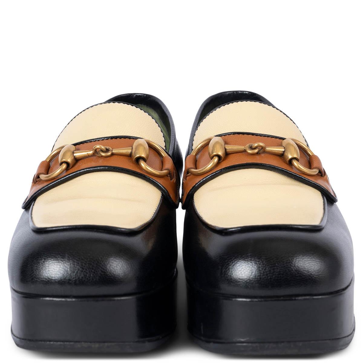 100% authentische Gucci 2019 Hosebit Plateau-Loafer aus schwarzem, cremefarbenem und braunem Glattleder. Sie wurden getragen und sind in ausgezeichnetem Zustand. Es wurden schwarze Gummisohlen hinzugefügt. Kommt mit Staubbeutel.
