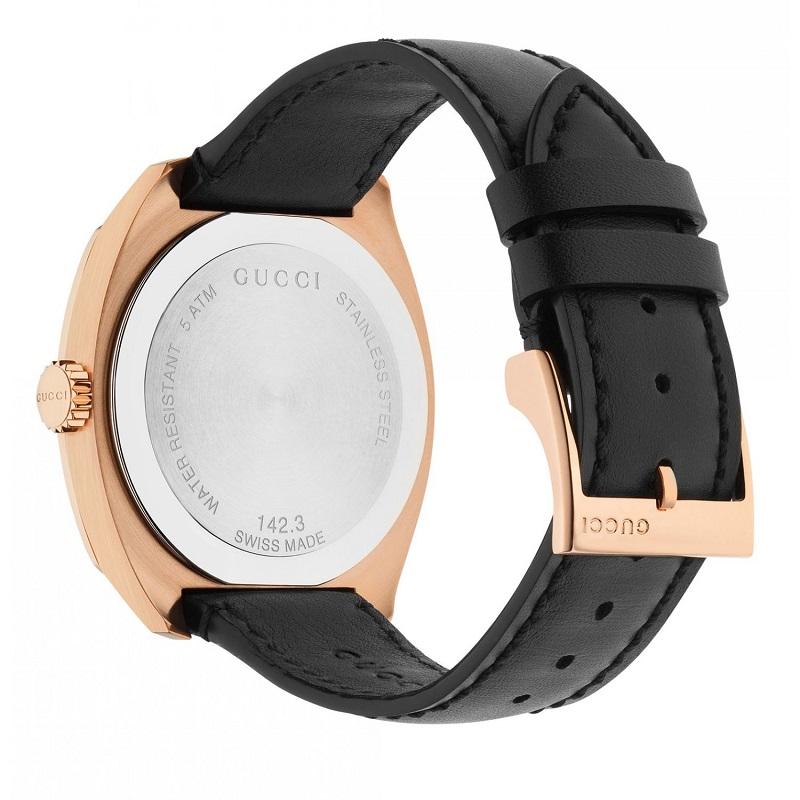 Rose gold-tone stainless steel case with a black leather strap. 
Fixed rose gold-tone bezel. 
Black dial with luminous rose gold-tone hands and index hour markers. 
Minute markers around an inner ring. 
Dial Type: Analog. Luminescent hands. Date