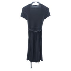 Gucci - Petite robe de cocktail noire à manches courtes et col en V avec nœud papillon GG en mélange élastique