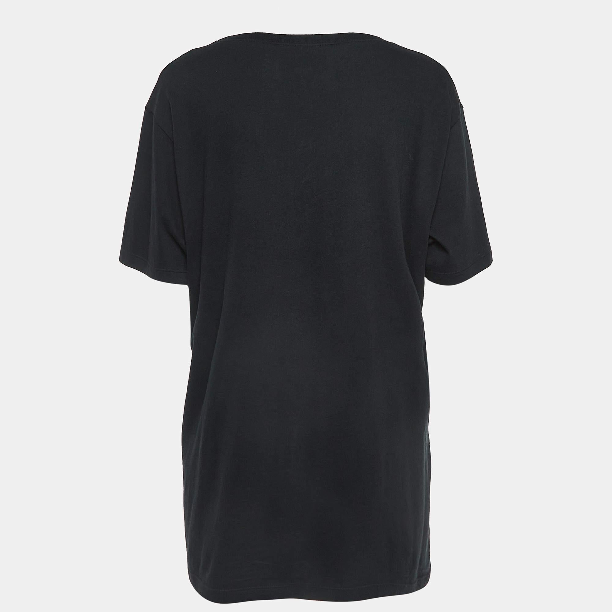 The Gucci t-shirt combines luxury and casual style. Crafted from soft cotton, it features a black base with intricate sequin embellishments, showcasing the iconic Gucci logo. The shirt effortlessly blends comfort and sophistication, making it a