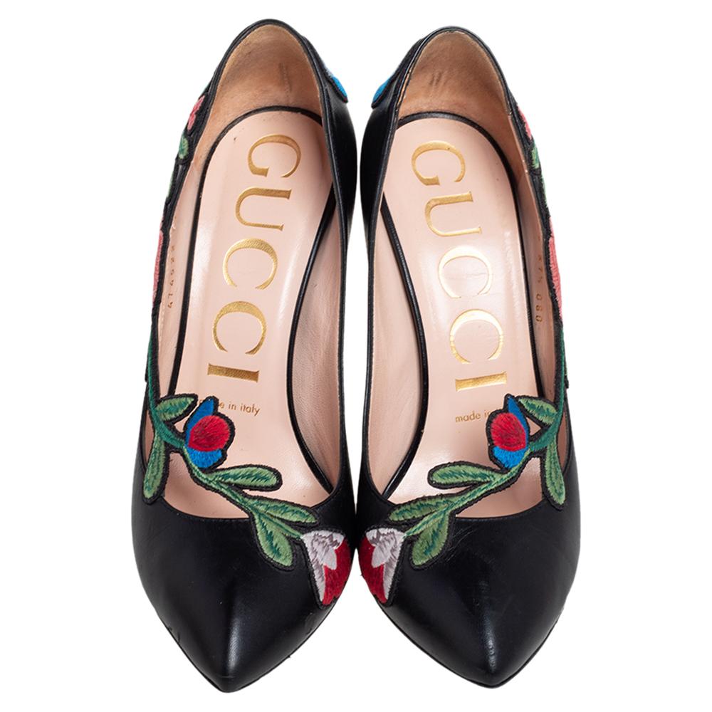 Gucci's timeless aesthetic and stellar craftsmanship in shoemaking is evident in these stunning pumps. Crafted from black leather, the silhouette is elevated by patches of floral embroidery that add a feminine finish. They are raised on slender