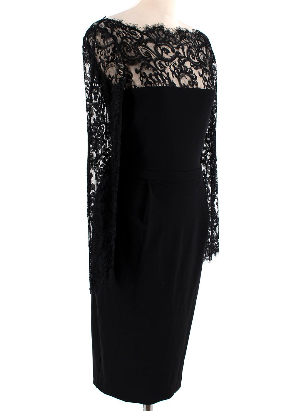 Gucci Black Lace Front Fitted Midi Length Dress

- Elegant black fitted dress
- Intricate lace detailing around neckline and arms 
- Eyelash lace trimming 
- Midi length 
- Back zip closure and button fastening at neck 
- Darted skirt