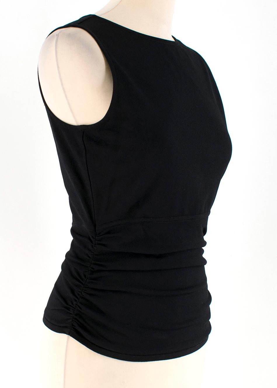 Gucci Black Fitted Sleeveless Top

- Black slim fit sleeveless top
- Round neck
- Gathered detailing on both sides
- Thin cutout on the back

Please note, these items are pre-owned and may show some signs of storage, even when unworn and unused.
