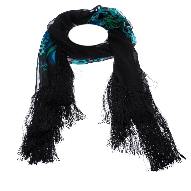 Beautifully cut from silk, this black Gucci scarf features pretty floral prints. It has a soft feel and is finished with fringed edges. Make this gorgeous scarf yours today, and flaunt it like a fashionista!

Includes: The Luxury Closet Packaging

