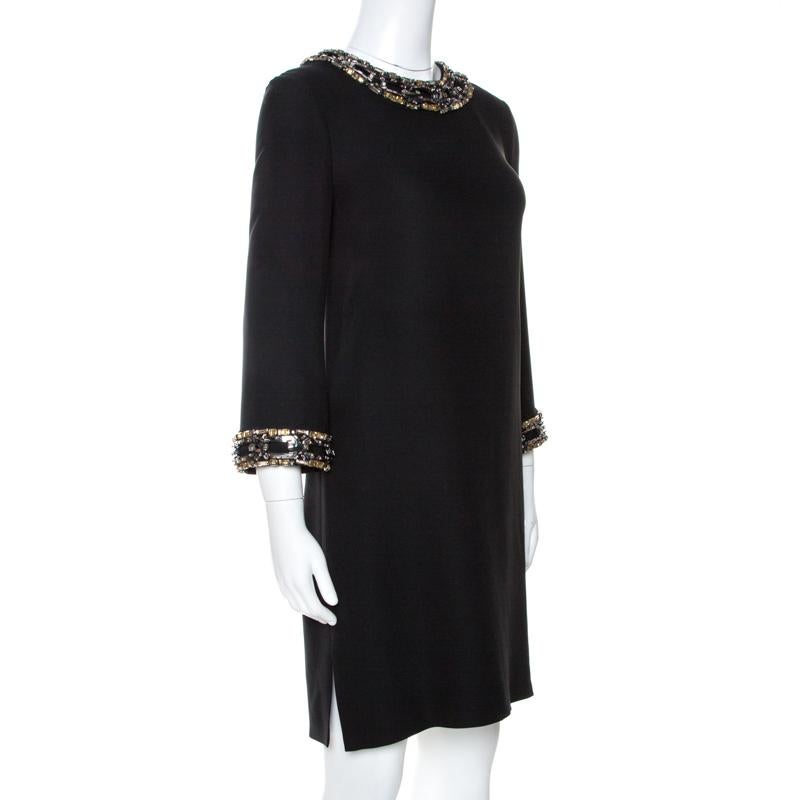 The tailoring of this dress is definite and exquisite making it another perfect creation by Gucci. It comes in black with embellishments on the neckline and sleeves, and a hemline ending above the knees. Make a worthy addition to your collection