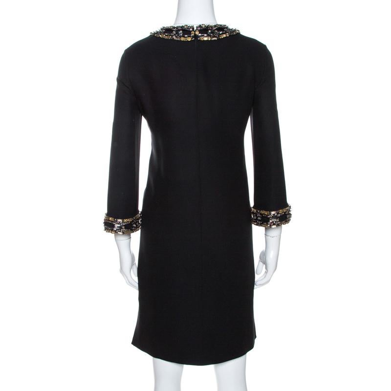 The tailoring of this dress is definite and exquisite making it another perfect creation by Gucci. It comes in black with embellishments on the neckline and sleeves, and a hemline ending above the knees. Make a worthy addition to your collection