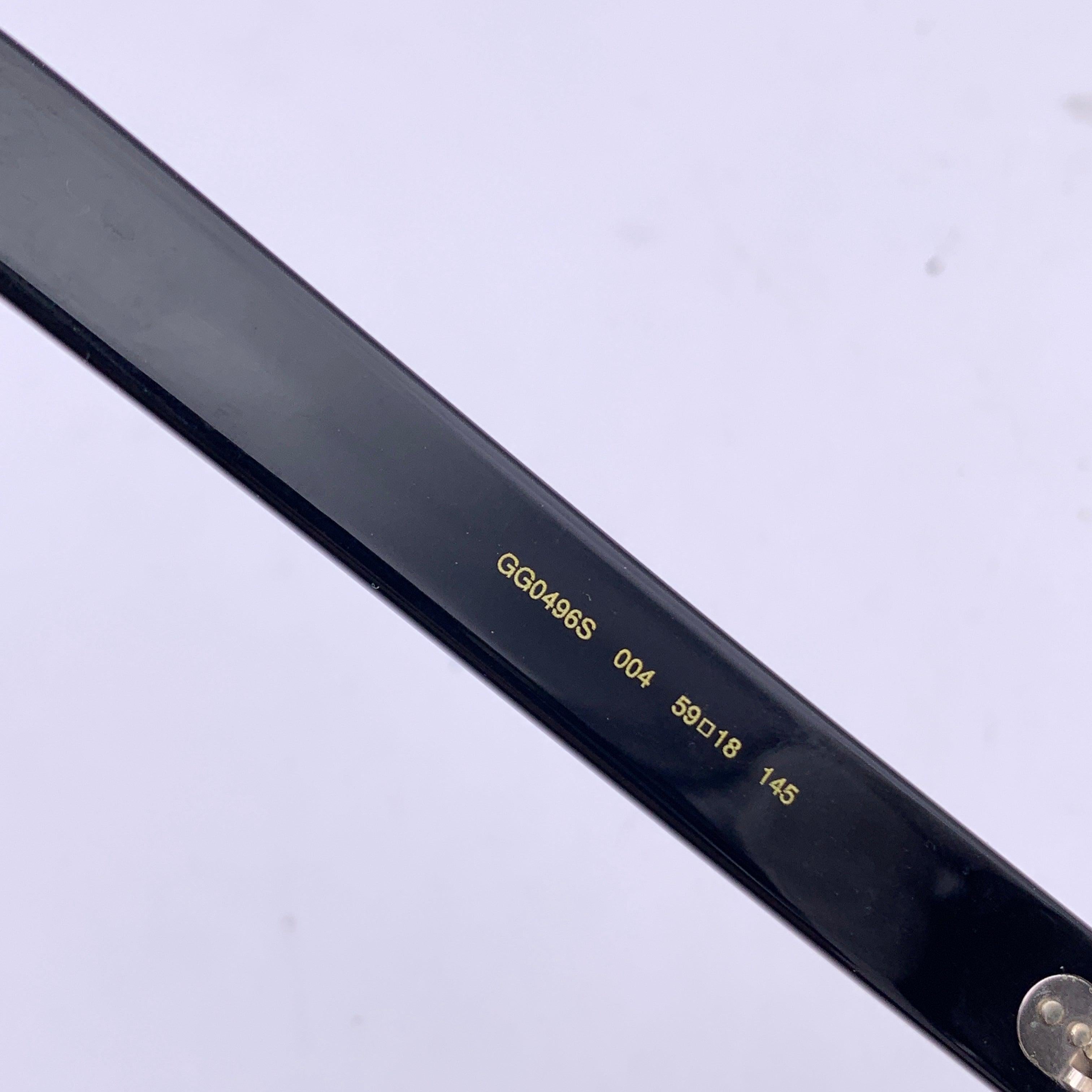 Occhiali da sole Gucci con montatura nera e strass GG0496S 59/18 145mm in vendita 1