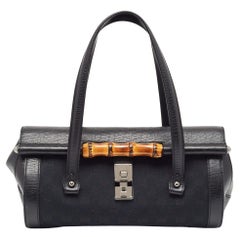 Sacoche Bullet en toile et cuir Bamboo GG de Gucci, noir