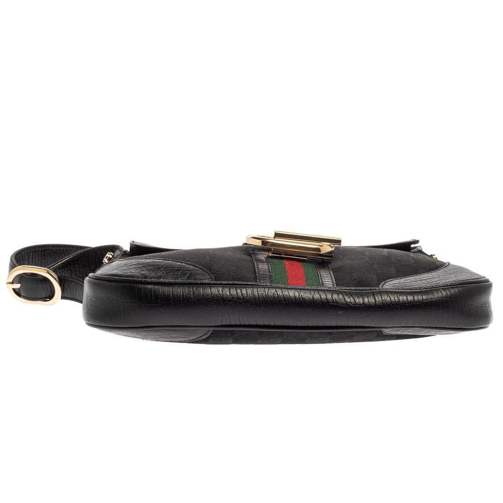 Gucci Schwarze GG Umhängetasche aus Canvas und Leder mit G-Schnalle 1