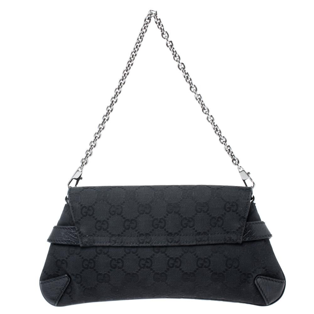 One look at this clutch from Gucci and you will know right away why it is luxury. Crafted in Italy, it is made from the brand's signature GG canvas and leather. It comes in a lovely shade of black and is equipped with a front flap that opens to a