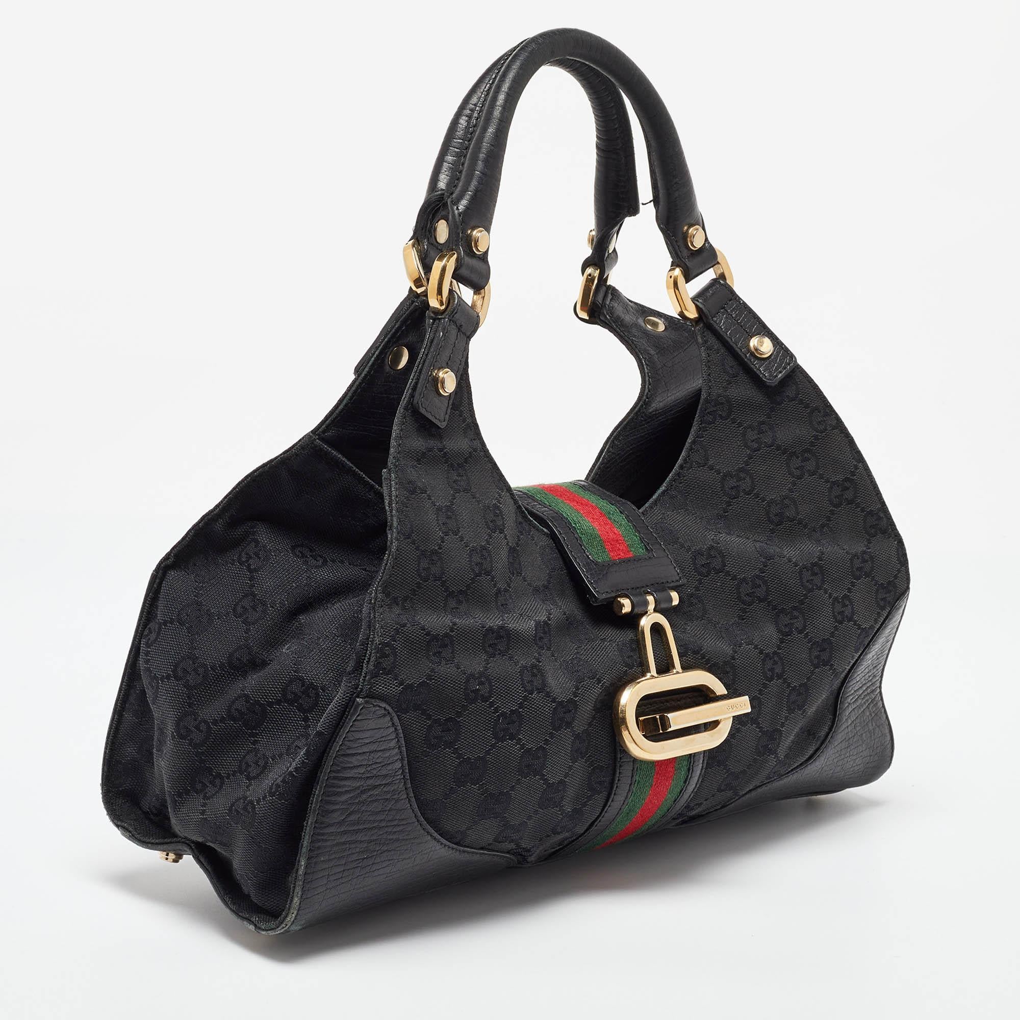 Nero Gucci Borsa a tracolla nera in tela e pelle GG Junco in vendita