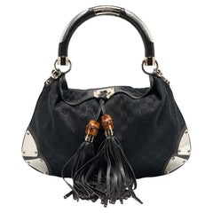 Gucci - Sac hobo « Babouska Indy » en toile et cuir noir GG, taille moyenne