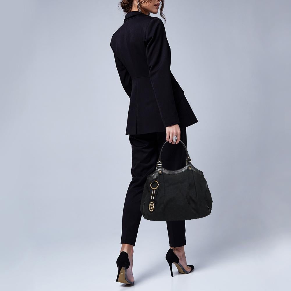 The Sukey is one of the best-selling designs from Gucci and we believe you deserve to have one too. Crafted from GG canvas and leather and equipped with a spacious interior, this bag is ideal for you and will work perfectly with any outfit. It is