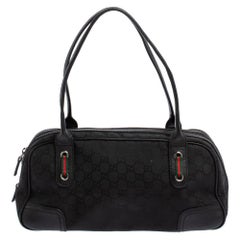 Gucci Schwarze GG-Tasche aus Segeltuch und Leder Princy Boston