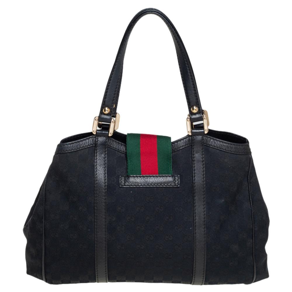A handbag should not only be good-looking but also durable, just like this pretty New Ladies Web tote from Gucci. Crafted from the signature GG canvas in Italy, this gorgeous number has a web detail as the flap and it opens up to a spacious fabric