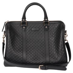 Gucci Schwarze Medium Boston Tasche aus Kalbsleder mit GG-prägung Microguccissima Medium