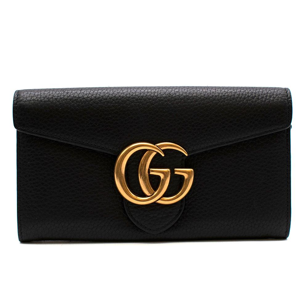 Gucci Black GG Marmont Grained Leather Long Wallet

-Iconic classic style
-Made of soft grained leather 
-Antique gold-toned hardware
-Double G Marmont Hardware 
-12 card slots and two bill compartments
-Two separate interior compartments
-Zip coin