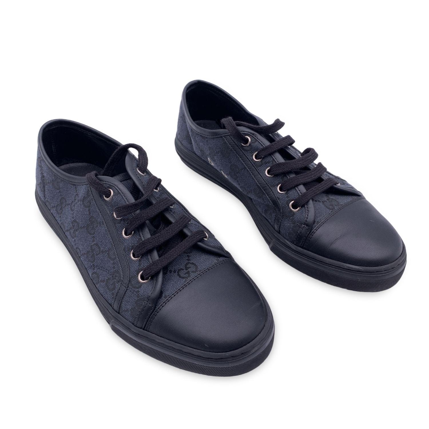 Gucci black monogram sneakers. Low-top canvas and leather sneakers Round toe. Lace-up closure in black. Rubber outsoles. Size 40 Condition A - EXCELLENT Some wear of use on the outsoles. Gucci box included. Details MATERIAL: Cloth COLOR: Black