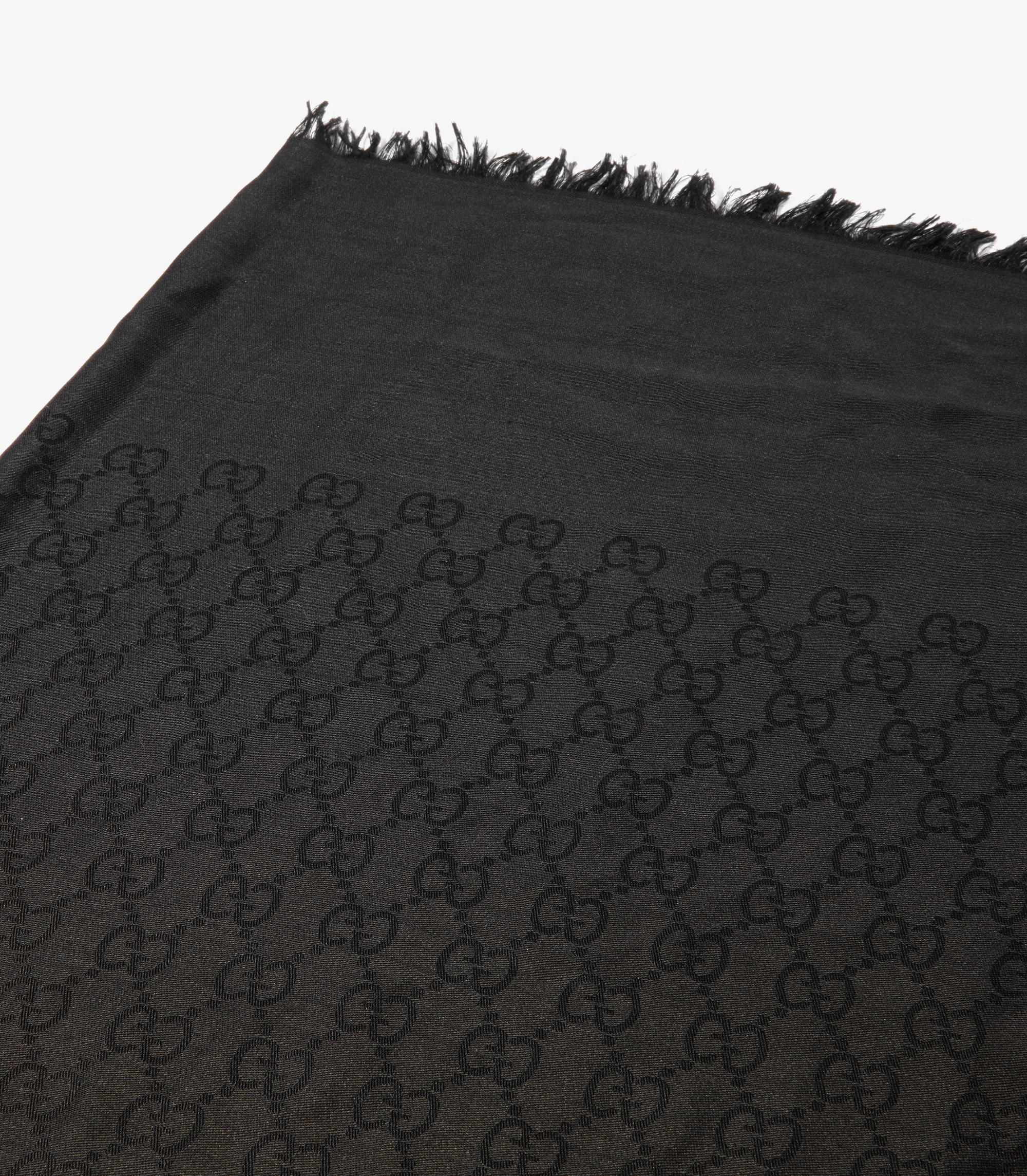 Gucci Black GG Silk Jacquard Fringed Scarf

Product Details
Xupes Ref: AA0333
Brand: Gucci
Model: Scarf
Type: Scarf
Accompanied By: Gucci Bag
Colour: Black 
Material(s): Silk, Wool

Specification
Height: 135cm
Width: 135cm
Country of Origin: