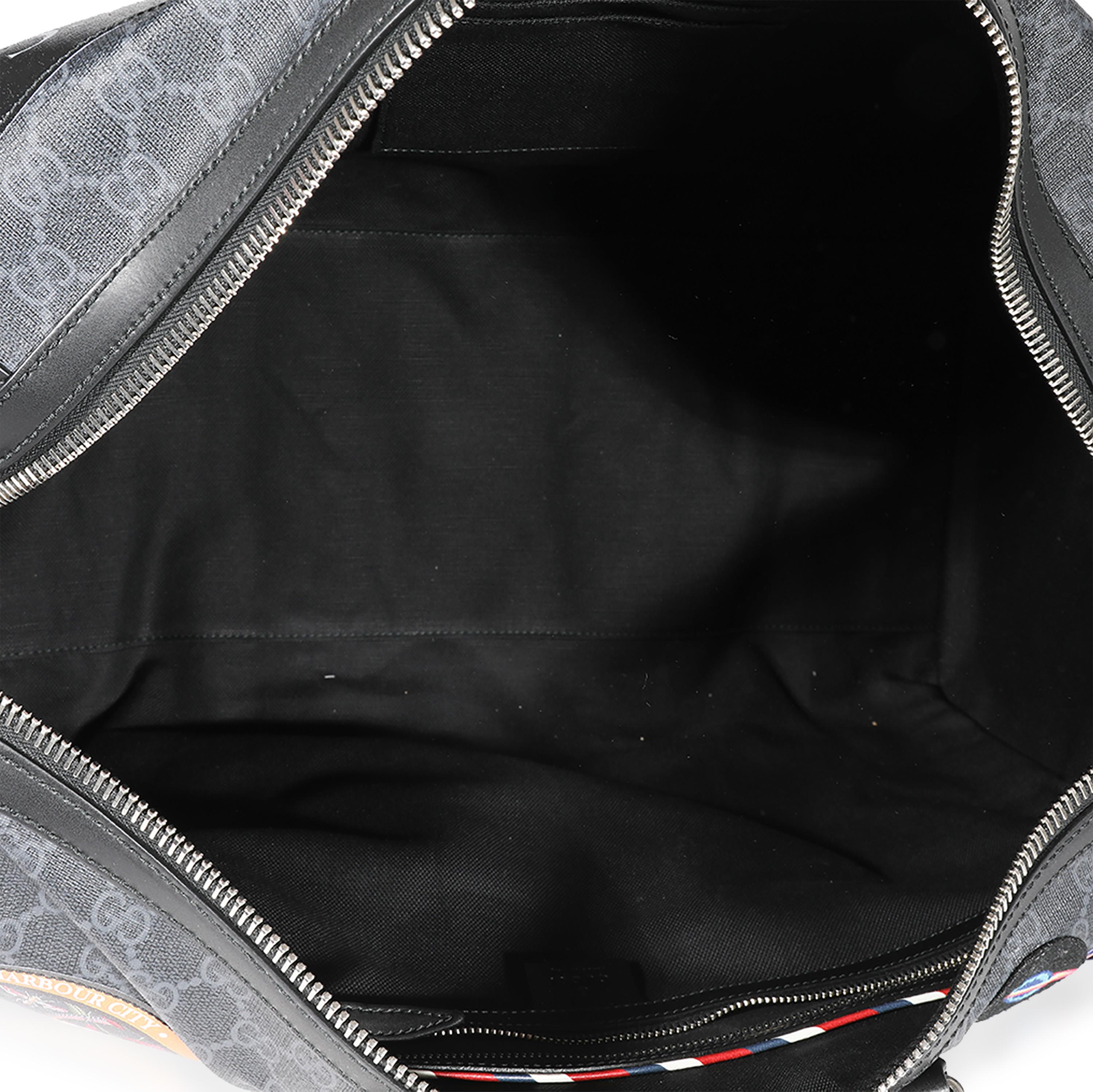 Listing Title: Gucci Black GG Supreme Canvas Night Courrier Carry-On-Duffle
SKU: 122555
Condition: Pre-owned 
Handbag Condition: Very Good
Condition Comments: Very Good Condition. Scuffing at exterior leather. Faint scratching at hardware. Light