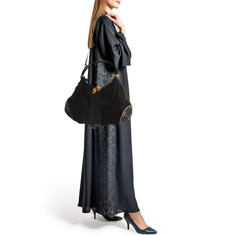 Stylish handbags never fail to make a fashionable impression. Make this designer hobo yours by pairing it with your sophisticated workwear as well as chic casual looks.