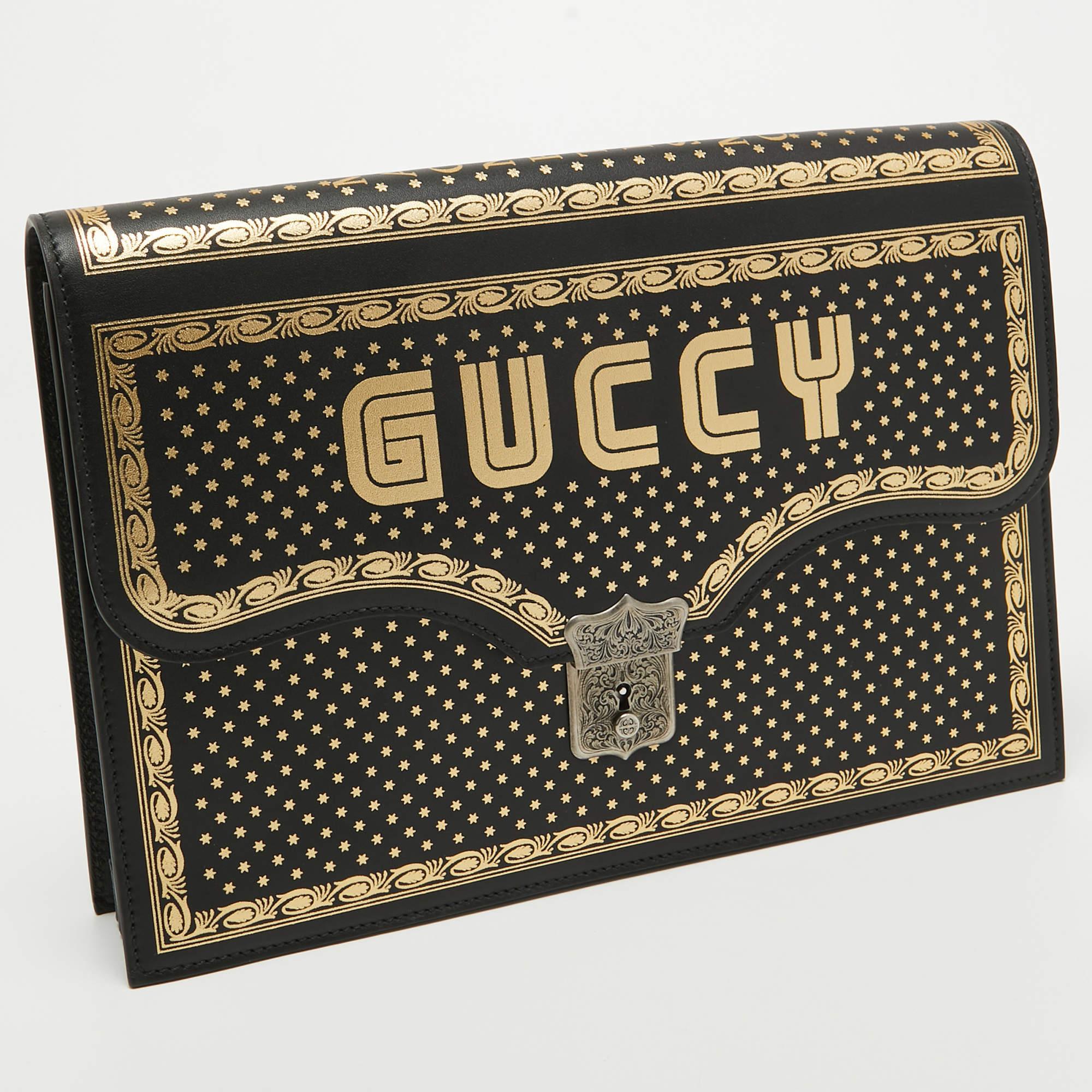 Gucci Black/Gold Leather Printed GUCCY Portfolio Clutch In Excellent Condition For Sale In Dubai, Al Qouz 2