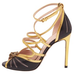 Gucci Schwarz/Gold Leder Tigerkopf Riemchensandalen Größe 36