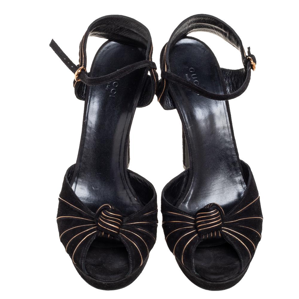 A feminine flair and a sophisticated appeal characterize these stunning Gucci sandals. Crafted using quality materials, they will add an opulent charm to your look and complement many looks that you would want to create.

