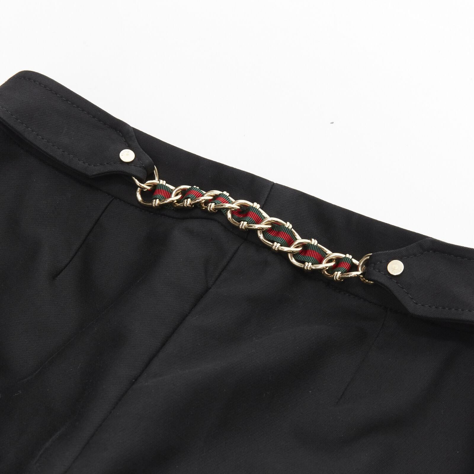 GUCCI black gold web chain trim back kick flared trousers pants IT38 XS
Reference: ANWU/A00433
Brand: Gucci
Designer: Tom Ford
Material: Feels like cotton
Color: Black
Pattern: Solid
Closure: Zip Fly
Lining: Unlined
Extra Details: Chain trim