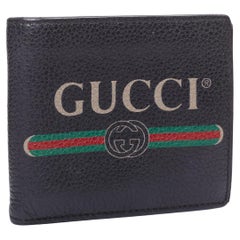 GUCCI black grained leather vintage logo bifold wallet