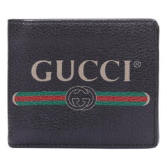 GUCCI black grained leather vintage logo bifold wallet
