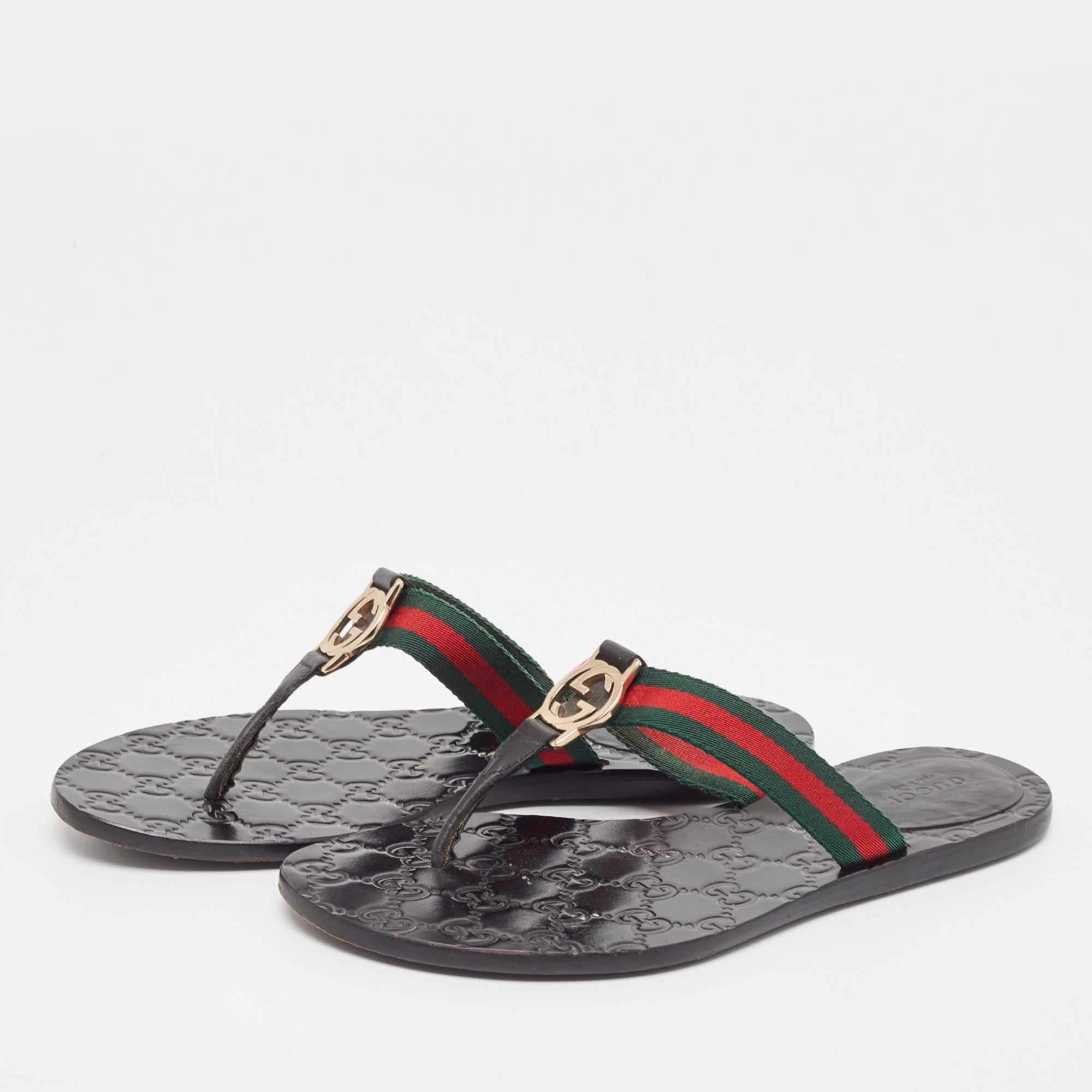 Designed with several House elements together, these Gucci sandals will infuse luxury into your outfit. The insole is detailed with a GG pattern, and they combine red and green Web straps with an interlocking 'G' motif on the front. Made from