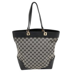 Schwarze/graue GG Bucket Tote aus Segeltuch und Leder von Gucci