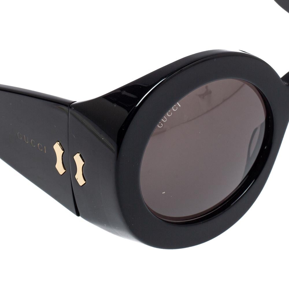black oversized round sunglasses