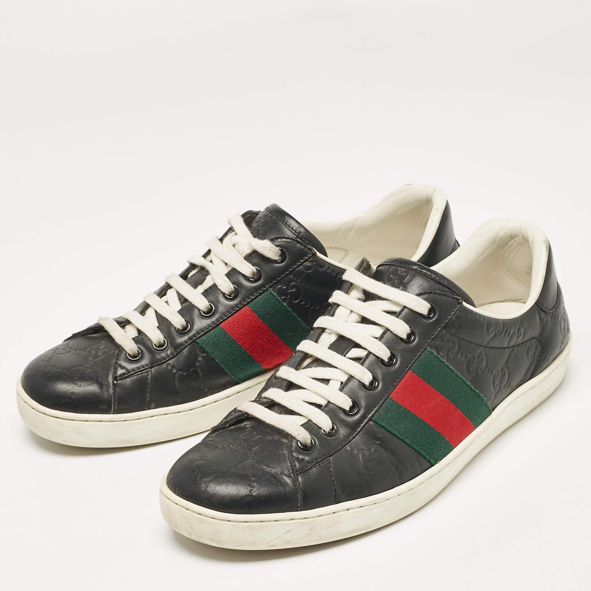 Infused with signature elements  these Gucci sneakers will make your days comfortable. They are constructed from Guccissima leather and are added with a Web stripe detailing on the sides. With lace up vamps and rubber soles  this pair aims to