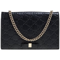 Gucci Schwarz Guccissima Leder Bow Flap Wallet auf Kette
