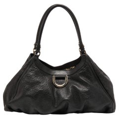 Gucci - Grand sac porté épaule « D Ring » en cuir noir Guccissima