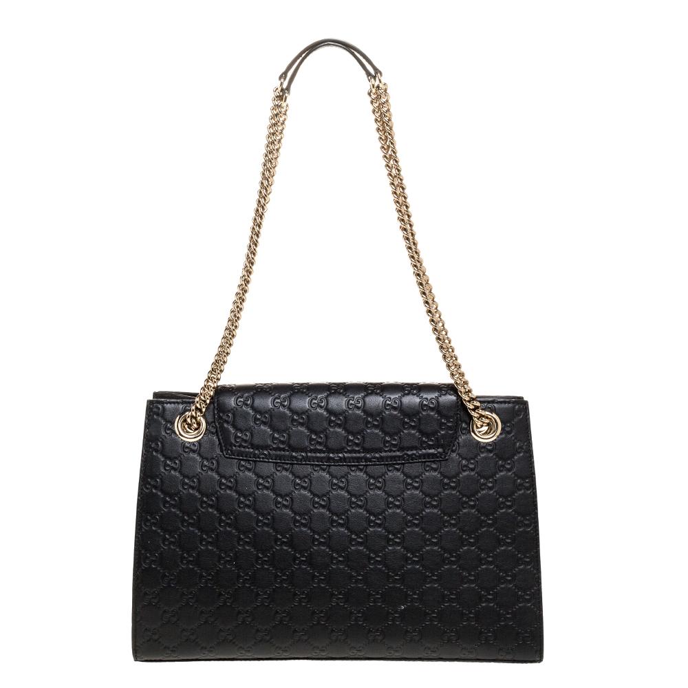 Gucci's handbags are not only well-crafted but they are also coveted because of their high appeal. This Emily Chain shoulder bag, like all of Gucci's creations, is fabulous and closet-worthy. It has been crafted from Guccissima leather and styled