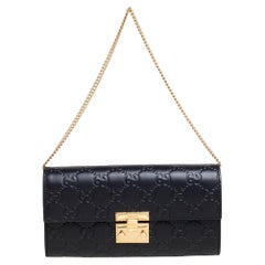 Gucci Schwarz Guccissima Leder Padlock Kette Continental Brieftasche