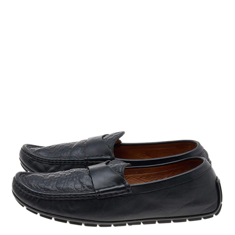 This pair of smart black Gucci shoes are ideal for daily wear or a casual Friday in the office. Crafted in Guccissima leather, these penny slip-on loafers are a perfect blend of comfort, style, and durability.

