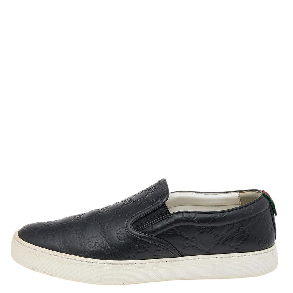 Exude a look of high style with these black sneakers from Gucci. These loafers are crafted from Guccissima leather and feature the signature Web trim on the counters. Made in Italy, this pair is sure to provide you with maximum comfort with its