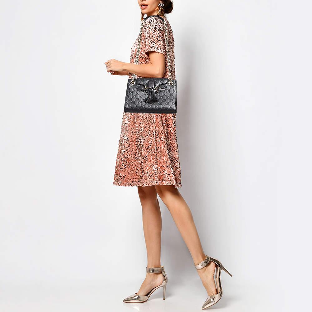 With a perfect blend of archival details and contemporary design this Gucci Emily bag is desirable. It has impressed style enthusiasts with its understated charm and embodies an architectural shape. Made from Guccissima leather it can be carried